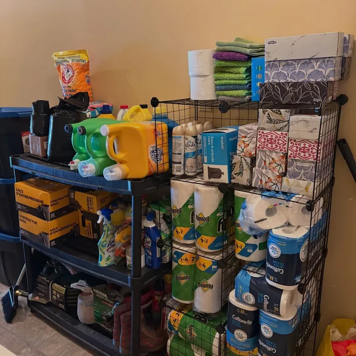 Overloaded supply shelf before organizing